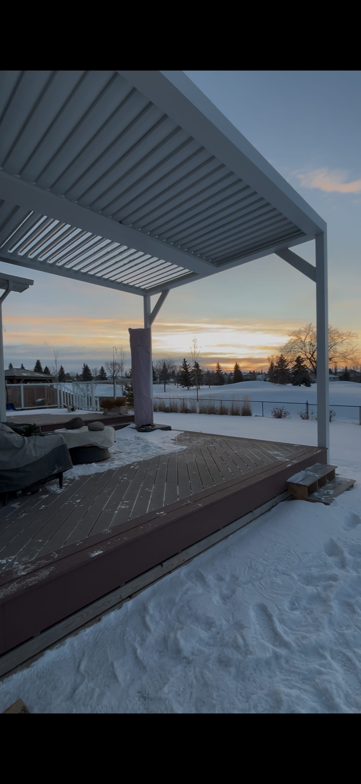 Pergola and outdoor sunshade lighting wired by Call Paul Contracting near Edmonton