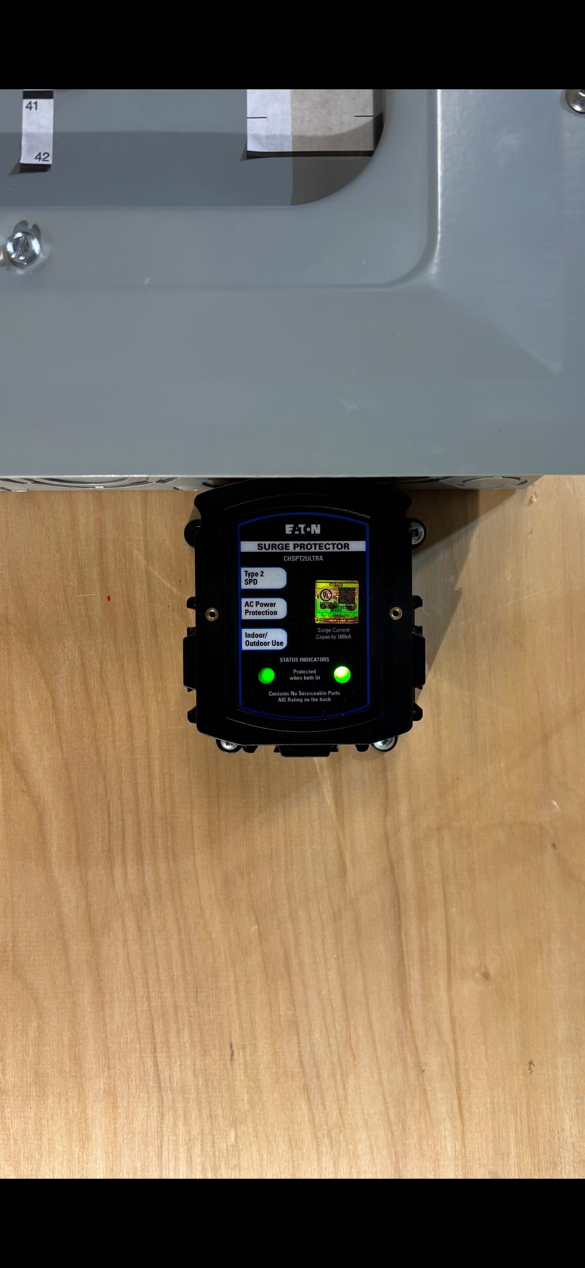 Eaton Type 2 whole-home surge protector installed at an electrical panel by Call Paul Contracting, Edmonton